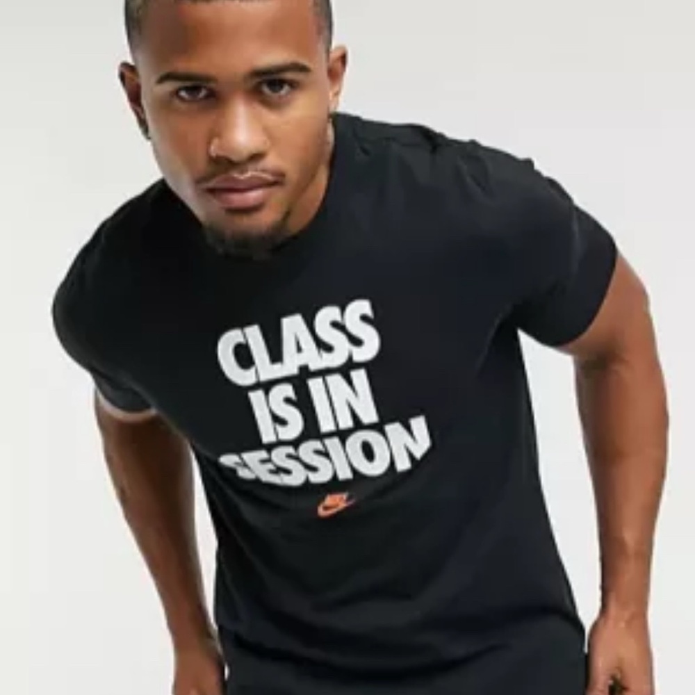 Nike Men's Black Tee with Bold Print